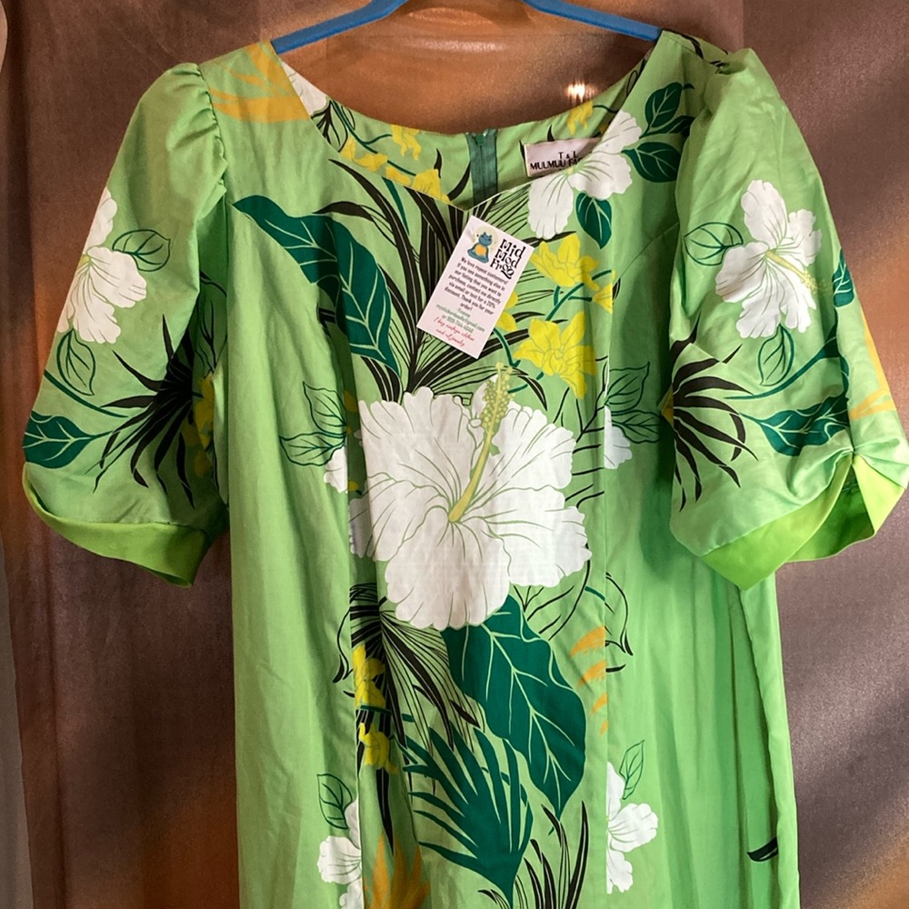 T & L Muumuu Factory.‎ XL? 46” chest lime green with white hibiscus. Stained 400